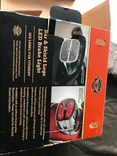 FOR SALE HARLEY DAVIDSON OEM REAR TAIL LIGHT. FITS ON A HARLEY SWITCHBACK. HARLEY DAVIDSON SELLS THI...