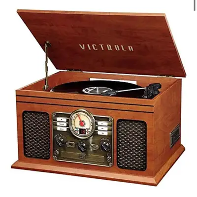 Like new, in excellent condition. Victrola The Quincy 6-in-1 Bluetooth Record Player & Multimedia Ce...