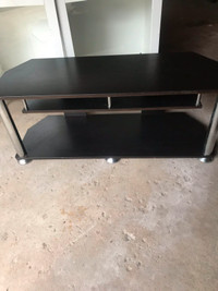 Black TV table (almost new) for sale
