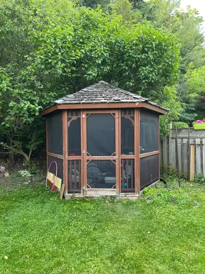 Screened cedar gazebo. Must take entire setup.