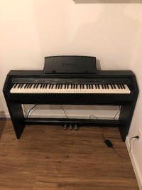 Casio digital piano (barely used near mint condition)