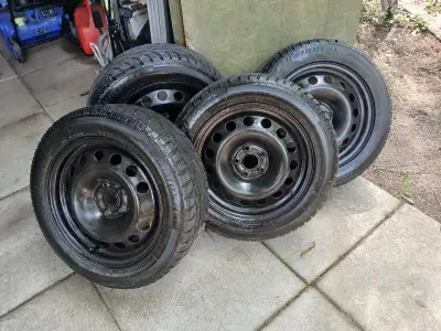 Uniroyal Tiger Paws Snow and Ice 205/55R16 91T low mileage like new rims included