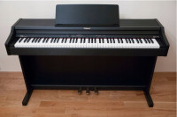 Roland RP 301 digital piano in satin black with bench