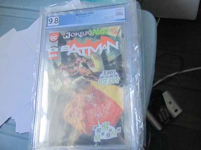 Lot of 2 different 9.8 pgx batman comics in Arts & Collectibles in Sudbury