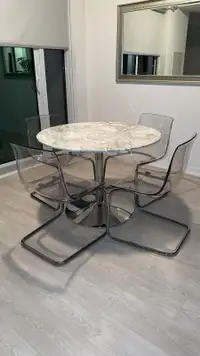 Beautiful marble table and clear chairs