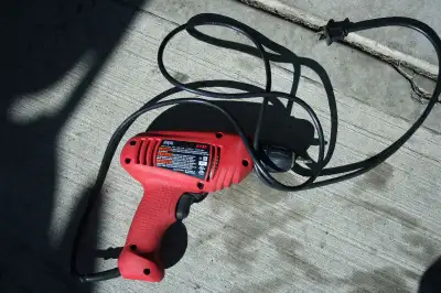 some corded / cordless tools --  drill, battery or charger