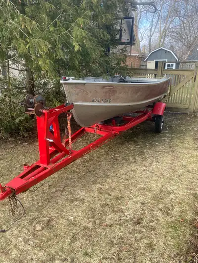 1990 14’ Lund aluminum boat. $2000 2004 9.9hp 4 stroke Honda outboard. $1800 Older bunk style traile...
