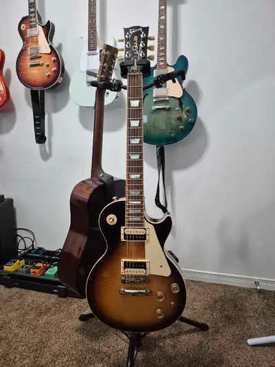 2015 Les Paul Classic, asking $2,350 obo. I will entertain some trade suggestions. Machine heads wer...