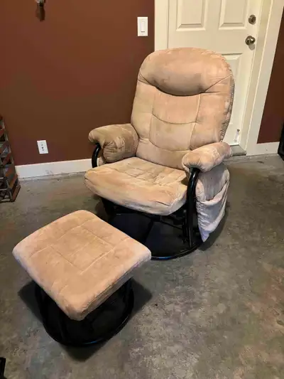 Giving away free nursing chair. Pretty comfy and glides back and forth well. Has a matching foot res...
