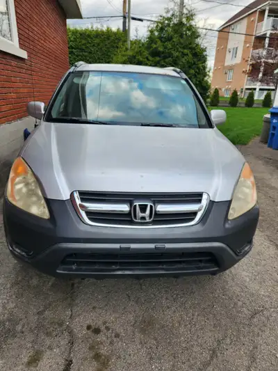 Honda CRV 2004, beaucoups de pièces changé 2000$ environ, pads, disques et galiper des freins arrièr...