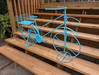Large metal bicycle plant pot holder decor. Holds 3 plant pots and can also have plants or other gar...