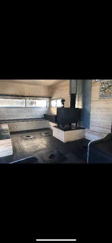 Camper ice shack for sale. Quality stove included, pine board walls, hole covers and sleeves, mine b...
