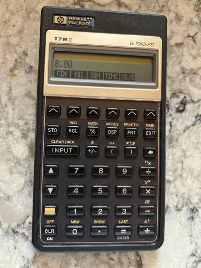 HP 17B II business financial calculator. It includes 3 brand new batteries, protective sleeve & manu...