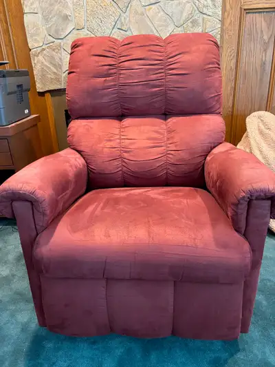 Lazy Boy Power Rocking Recliner Pre-owned. In good condition Burgundy Fabric Back rest is detachable...
