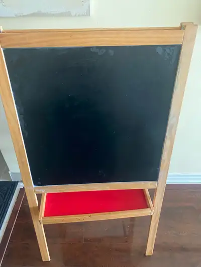 Unleash your little artist's creativity with this versatile, pre-loved wooden art easel, featuring b...