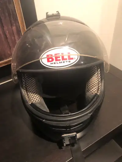 This is a Bell motorcycle helmet, offering reliable protection on the road, but please note that it'...