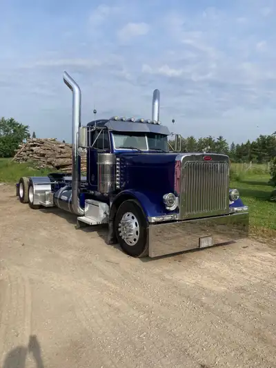 2004 Peterbilt 379. Caterpillar C15 engine, engine brake, 13 speed transmission, 12,000 and 40,000 a...