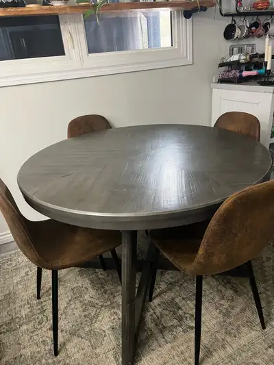 1 year old table and chairs. Bought table at Kent and chairs from wayfair. Paid $600 for table and $...