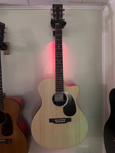 Martin X series guitar brand new barely used comes with original gig bag all paperwork and accessori...