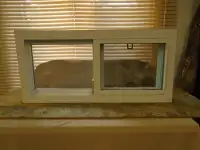 Basement slider window