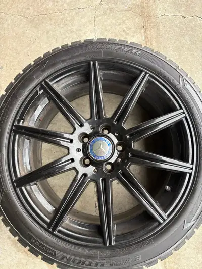 Black alloy rims I used seasonal for winter on my C43 with Cooper Evolution 225/45R18. Lots of tread...