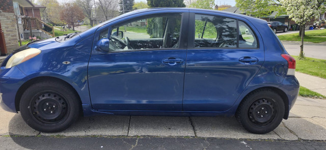 2010 Toyota yaris le 4dr hatchback four door sedan. in Cars & Trucks in City of Toronto - Image 2