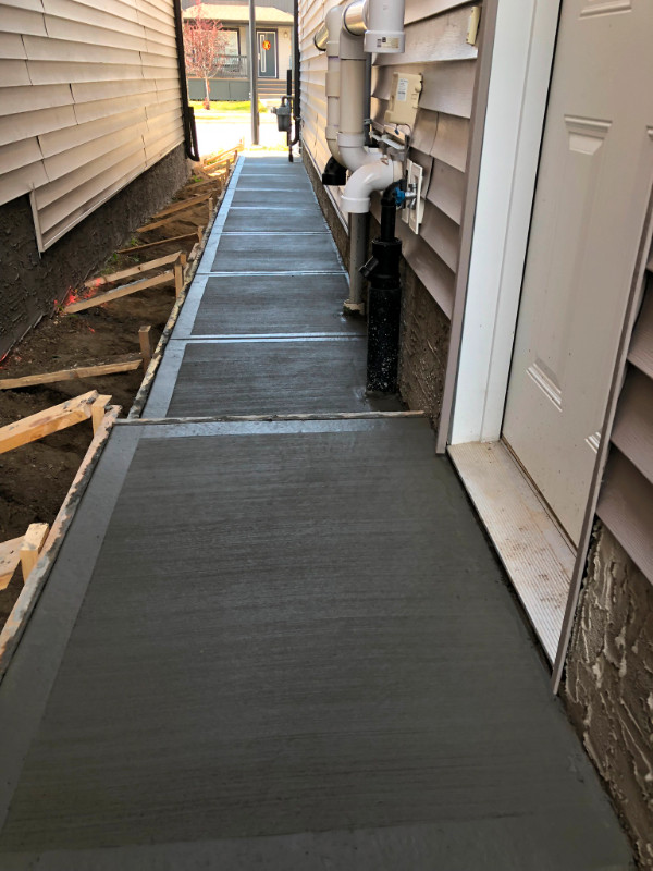 Concrete patios, sidewalks, driveway extensions Brick, Masonry