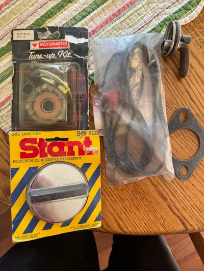 Points, gas cap, block heater and new cord, gasket.