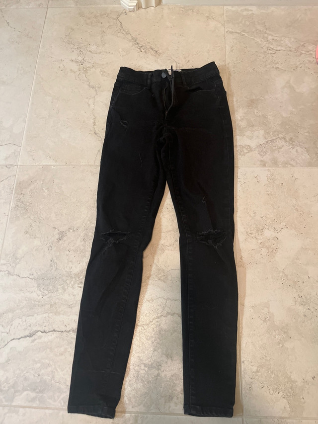 Black Ripped Jeans in Women's - Bottoms in Brantford