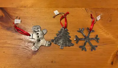 This set of 3 Christmas ornaments are cut, hand forged and textured to a personal style. One tree, o...