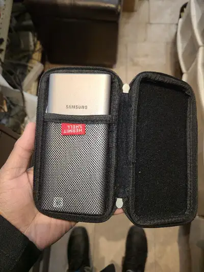 Samsung Wireless Battery Pack Charger with case and wire.