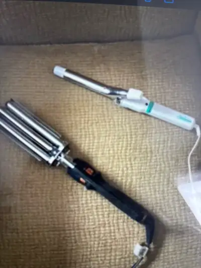 Get ready to curl with these two used curling irons! The first is a Conair instant heat curling iron...