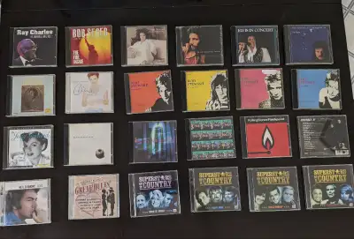 24 music CD's (some are double disc). Will sell separately for $4 each. Take them all (including the...