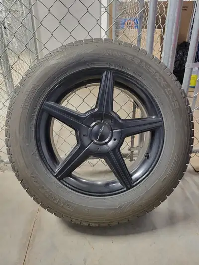 Set of 4 225/65R17 102R SL Dunlop WINTER MAXX tires mounted on Vision wheels. Tires are like new wit...