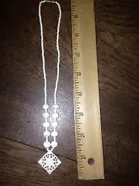 2  vintage ivory necklaces