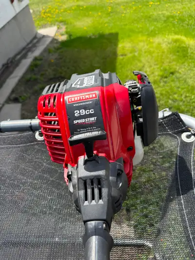 I have 2 for sale trimmers one was used as a spare the red craftsman and the main cub cadet but miss...