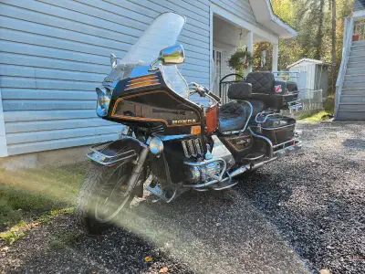 1982 Honda Goldwing Interstate. Needs a new battery, back brakes, and general tune up. Also comes wi...