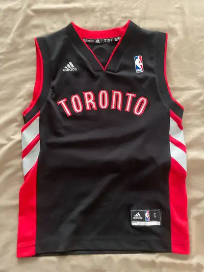 Toronto Raptors black/alternate jersey which they used from 2008-15. No name on the back. Jersey siz...