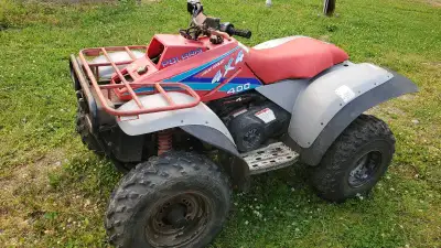 This pre-owned Polaris 400 ATV is a rugged and capable 4x4 machine ready for your next outdoor adven...