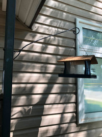 Flower pot hanger, bird feeders on deck railings or fence.