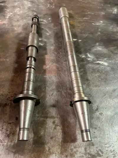 40 taper arbour for milling machine One is 1” and the other is 7/8 arbour with spacers $350 for the...