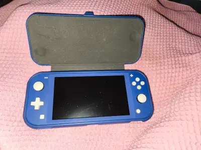 Blue Nintendo Switch Lite + Animal Crossing, View more