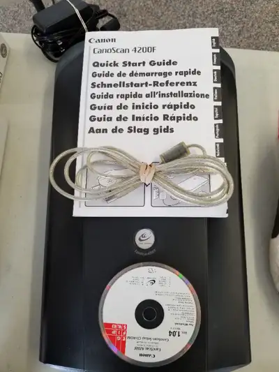 Canon 4200F Scanner. All cables needed included and the Software as well.