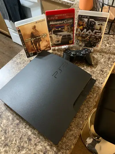 PS3 Slim Bundle w/ 3 Games, View more
