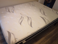Queen sized mattress and bed frame $300 OBO.