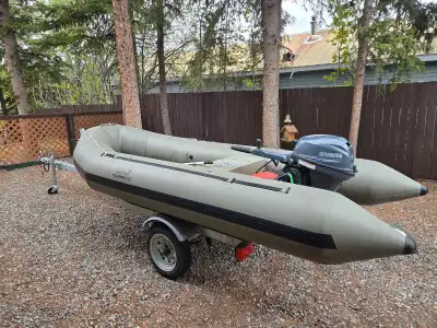 12foot 6inches Zodiac Boat in excellent condition. Comes with 9.9hp 4stroke outboard, trailer, patch...