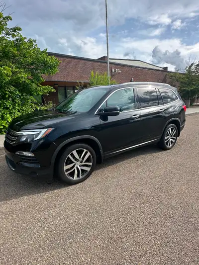 Mileage: 180,451 km Selling our well-maintained 2016 Honda Pilot Touring AWD. This has been an excel...