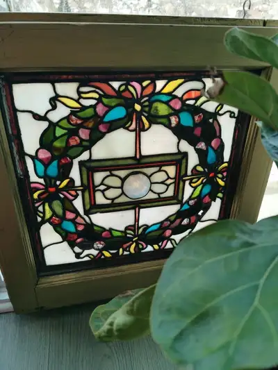 1900s-1920s Christmas Wreath themed Stained Glass window. One super special thing about this beauty...