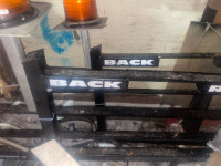 2 brand new back racks with single work light 