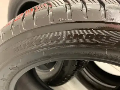 set of four Bridgestone Blizzak LM001 tires available. They are high profile RSC Run Flat (RFT) tire...